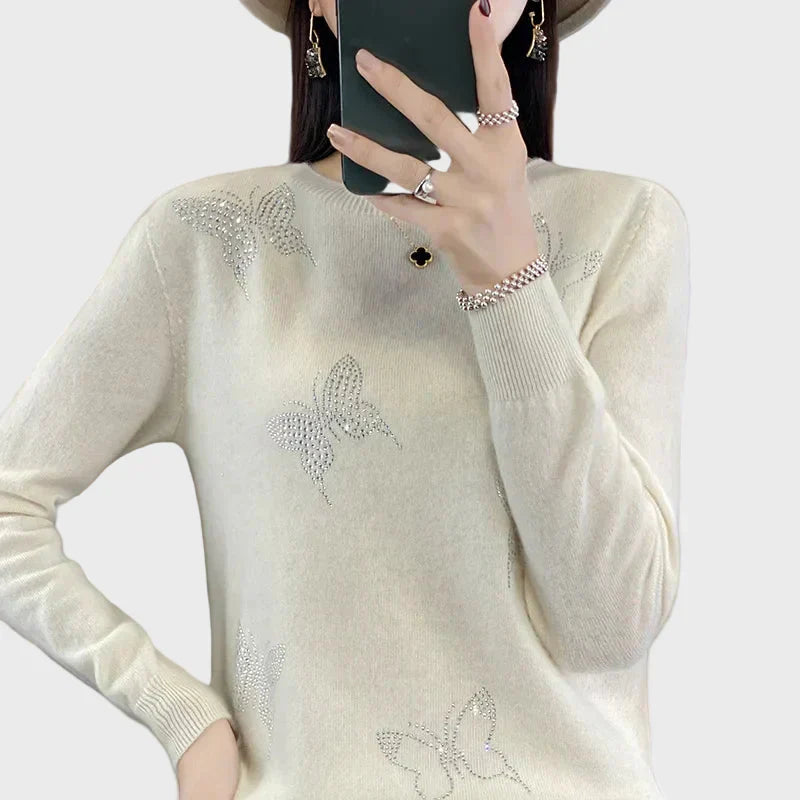 Damski pleciony sweter z wzorem motyla